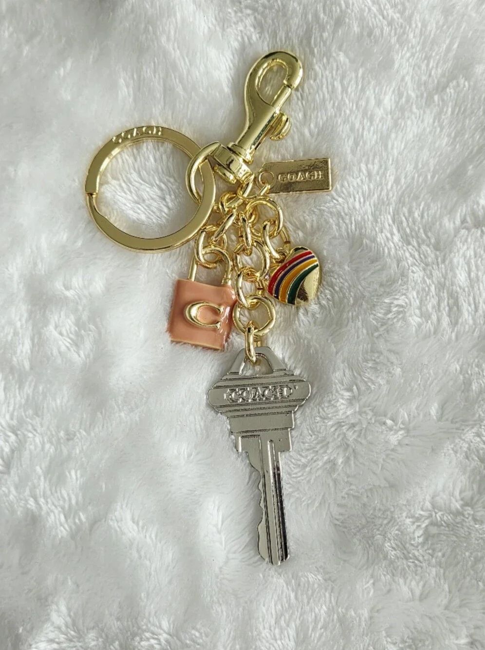 C Logo Gold-Tone Silver Key Keychain with Rainbow Heart and Pink Lock Accent